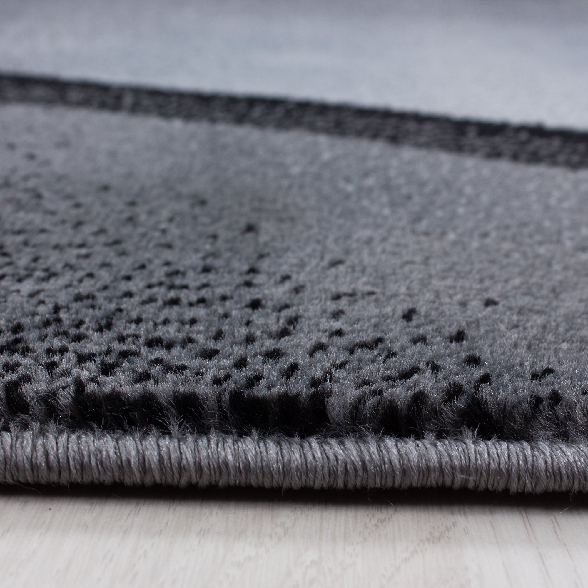 Modern short pile rug for living room, abstract wave design, easy to care for