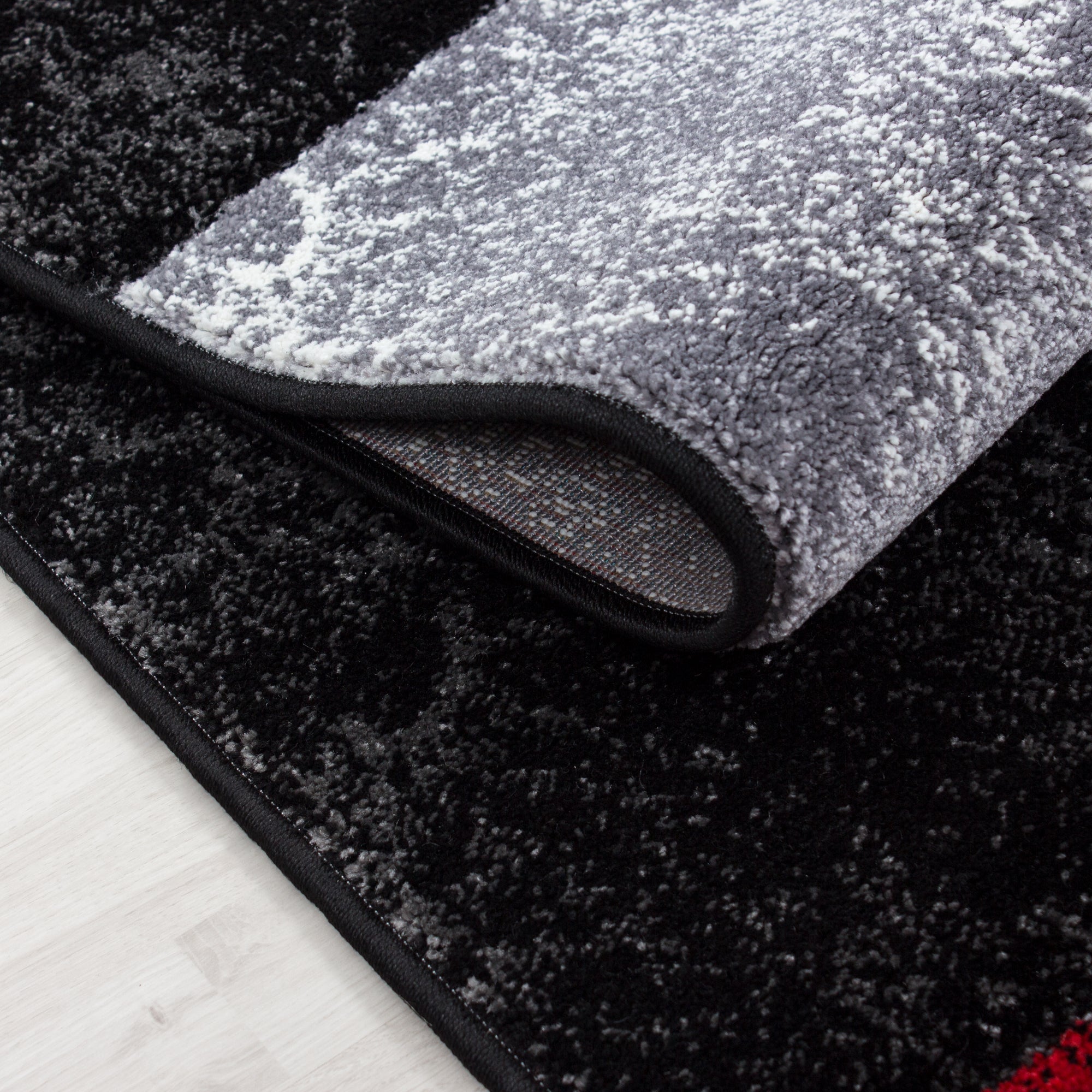 Tapis de salon design à poils courts, design moderne à carreaux, coupe aux contours doux