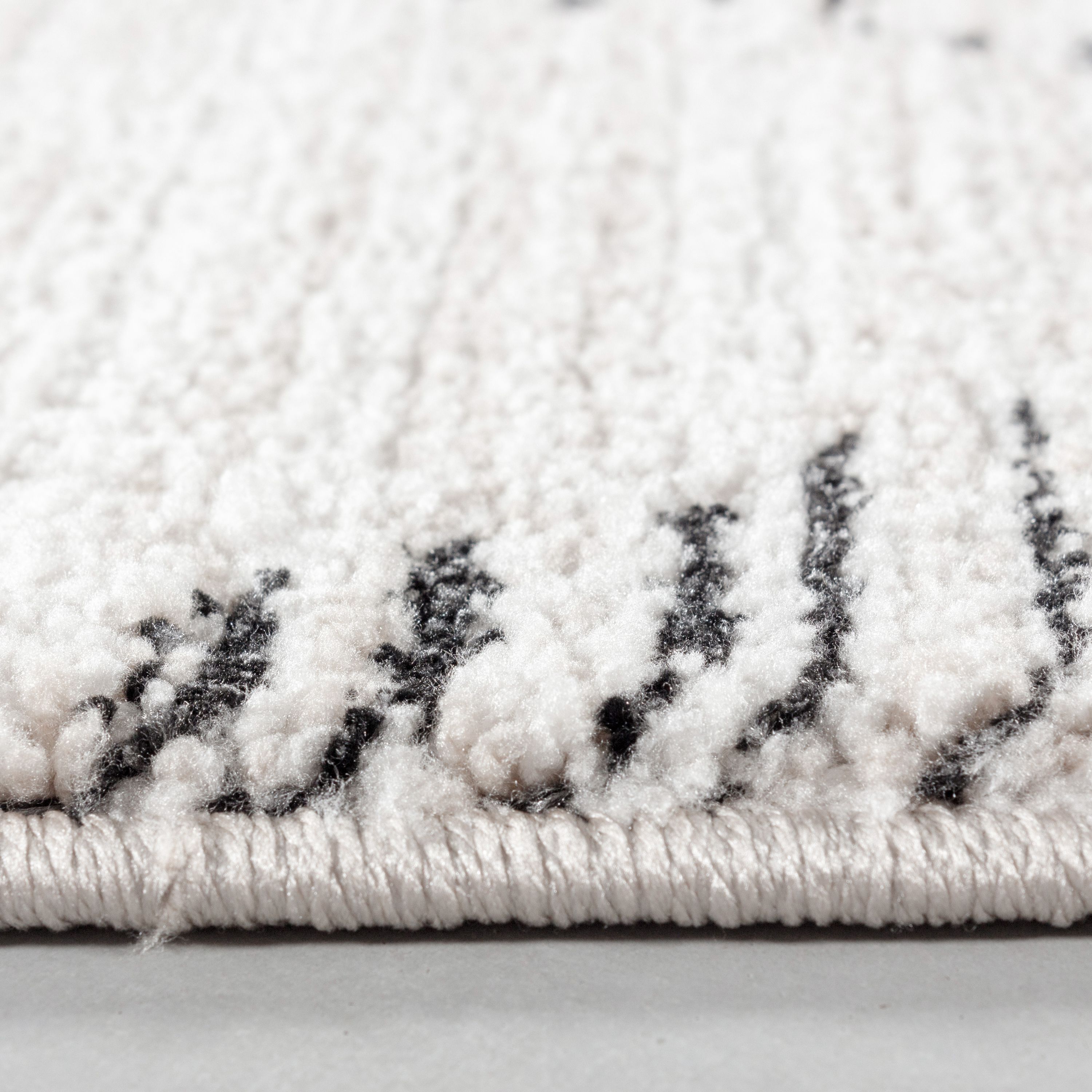 Tapis à poils courts salon tapis design scandinave style bohème aspect naturel